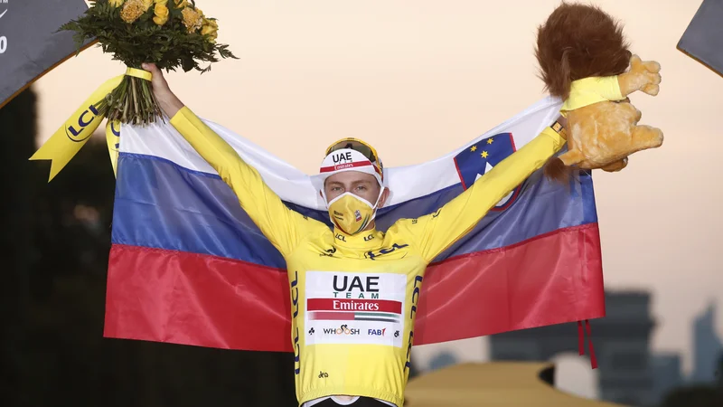 Fotografija: Tadej Pogačar je osvojil Tour de France, Primož Roglič je bil drugi. FOTO: Benoit Tessier, Reuters