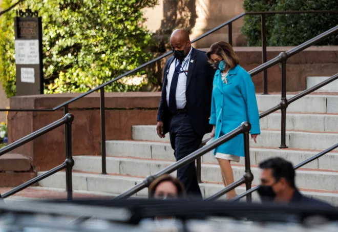 Nancy Pelosi pri maši. FOTO: Tom Brenner, Reuters