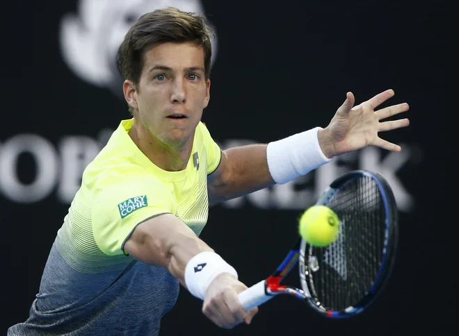 Aljaž Bedene je lani v drugem krogu OP Avstralije izpadel proti Ernestsu Gulbisu. Slovenec samo še v Melbournu ni prišel v tretji krog. FOTO: Thomas Peter/Reuters