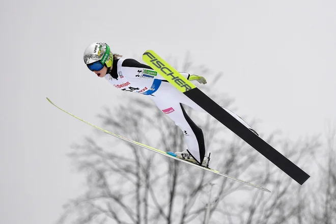 Nika Križnar je že šestič v tej sezoni skočila na zmagovalni oder. FOTO: Alex Nicodim/AFP