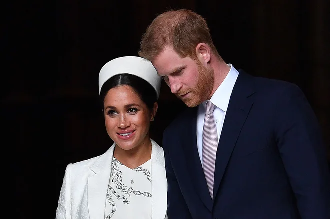 Britanski princ Harry in njegova soproga Meghan se dokončno odpovedujeta kraljevim dolžnostim. FOTO: Ben Stansall/AFP