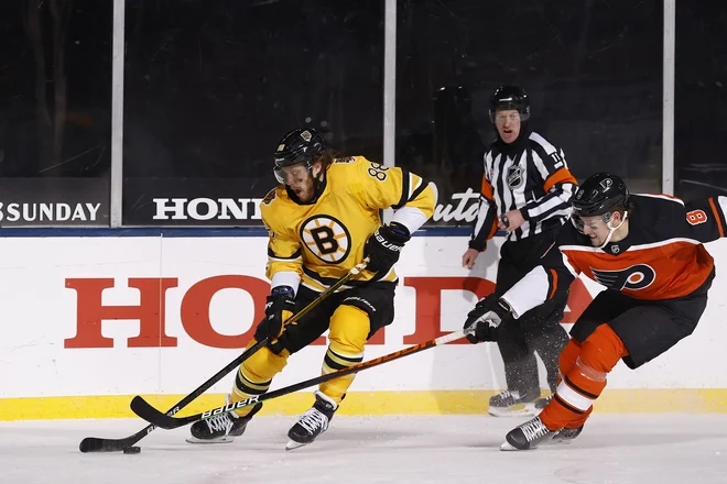 Glavni junak tekme je bil David Pastrnak s tremi goli. FOTO: Christian Petersen/AFP