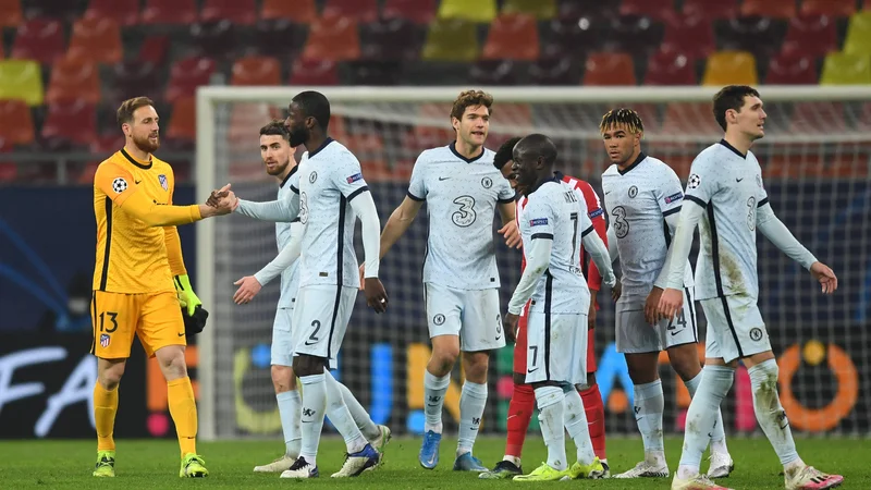 Fotografija: Jan Oblak je ustavil 4 strele Chelseajevih nogometašev, ob natančnem udarcu Olivierja Girouda je bil nemočen. FOTO: Daniel Mihailescu/AFP