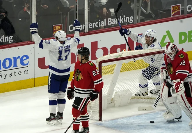 Alex Killorn je v podaljšku za pičlo desetinko sekunde prehitel sireno in Tampi priboril zmago. FOTO: Mike Dinovo/Usa Today Sports