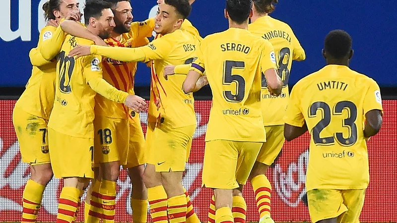 Fotografija: Barcelona je z zmago v Pamploni potrdila, da je v naletu in je pred nedeljskimi predsedniškimi volitvami vrnila optimizem na Camp Nou. FOTO: Ander Gillenea/AFP