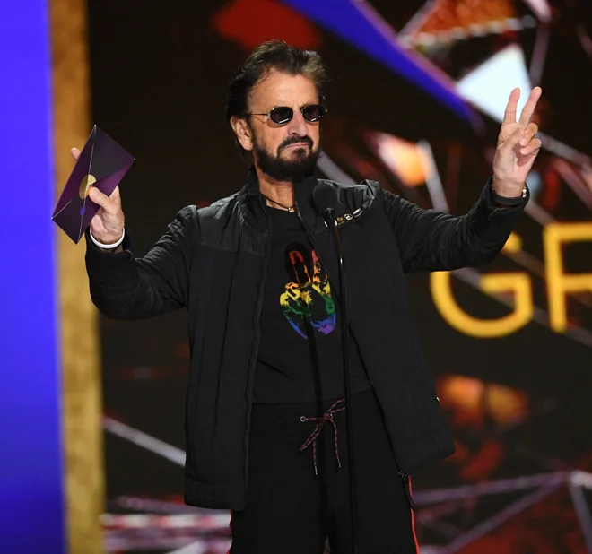 Ringo Starr je bil med govorniki. FOTO: Kevin Winter/AFP