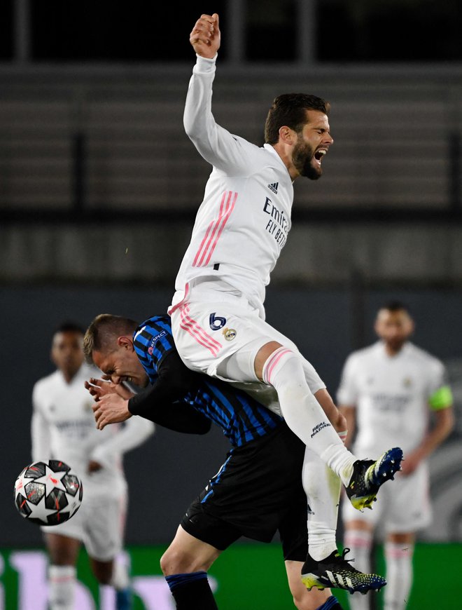 Nogometaši Reala so bili brez milosti do Josipa Iličića. FOTO: Pierre-Philippe Marcou/AFP