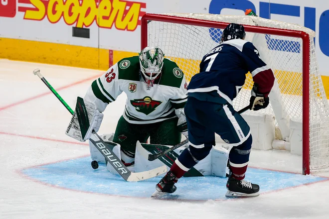 Minnesotin vratar Cam Talbot je imel veliko dela, ustavil je 50 izmed 55 strelov na svoj gol. FOTO: Isaiah J. Downing/Usa Today Sports