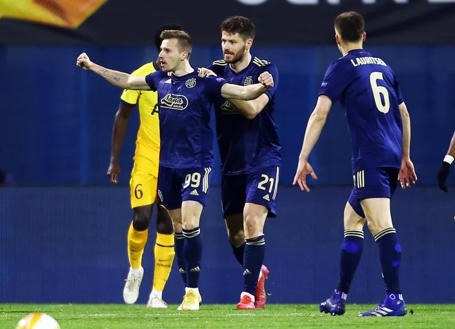 Soccer Football - Europa League - Round of 16 Second Leg - Dinamo Zagreb v Tottenham Hotspur - Stadion Maksimir, Zagreb, Croatia - March 18, 2021 GNK Dinamo Zagreb's Mislav Orsic celebrates scoring their second goal with teammates REUTERS/Antonio Bronic
