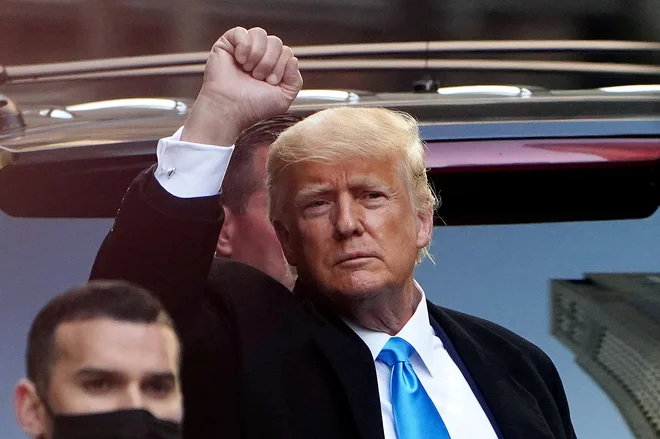 Nekdanji predsednik ZDA Donald Trump. FOTO: Carlo Allegri/Reuters