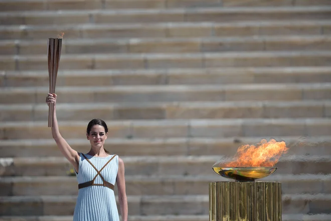 Olimpijski ogenj so prižgali že lani marca v Olimpiji. FOTO: Aris Messinis/AFP