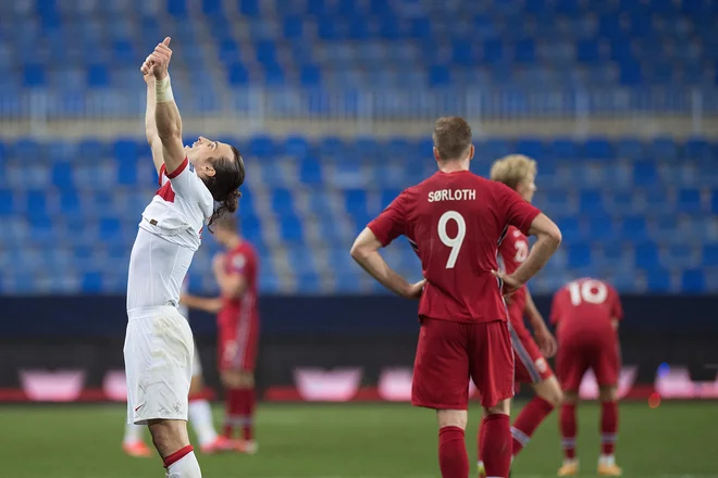 Turški nogometaši so na tekmi v španski Malagi slavili, Norvežani so bili poklapani. FOTO: Jorge Guerrero/AFP