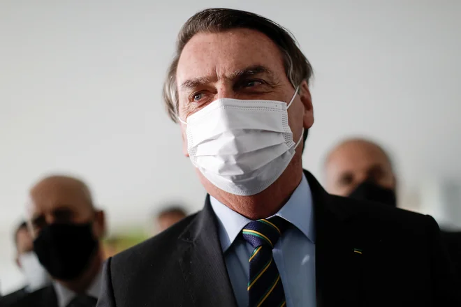 Brazilski predsednik Jair Bolsonaro&nbsp;je zamenjal kar šest ministrov, med drugim zunanjega, obrambnega in pravosodnega. FOTO: Ueslei Marcelino/Reuters