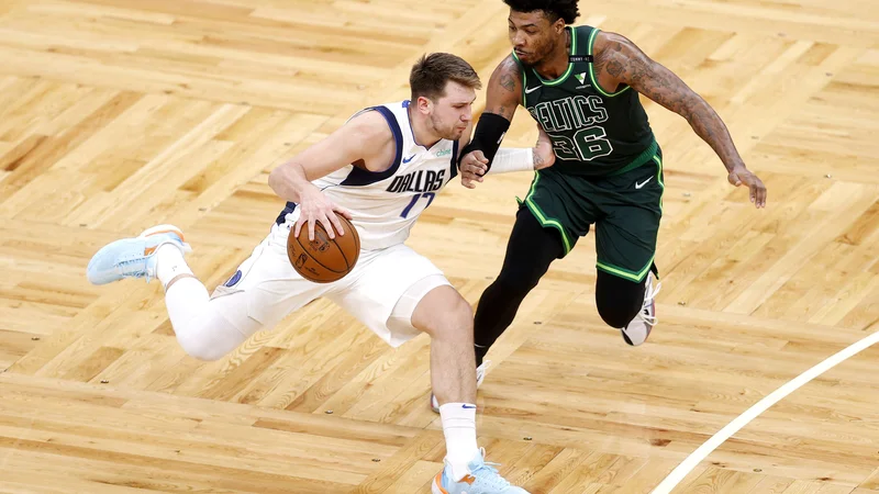 Fotografija: Luka Dončić je bil s 36 točkami prvi strelec tekme, na kateri je Boston vse do zadnje minute ogrožal zmago Dallasa. FOTO: Maddie Meyer/AFP