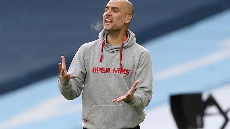 Pep Guardiola pravi, da si njegov klub v trenutnih finančnih okoliščinah preprosto ne more privoščiti nakupa novega napadalca. FOTO: Martin Rickett/AFP