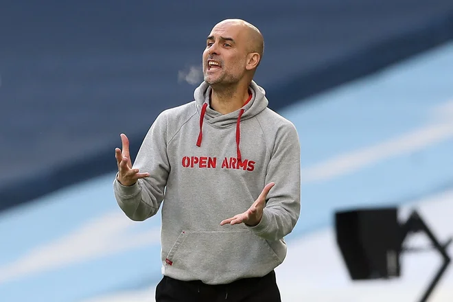 Pep Guardiola pravi, da si njegov klub v trenutnih finančnih okoliščinah preprosto ne more privoščiti nakupa novega napadalca. FOTO: Martin Rickett/AFP