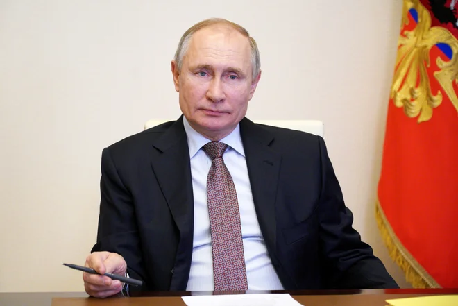 Vladimir Putin&nbsp;je bil prvič za predsednika Rusije izvoljen leta 2000.&nbsp;Nasprotniki so kritični do zakona, češ da mu bo omogočil, da bo postal dosmrtni predsednik. FOTO: Sputnik via Reuters