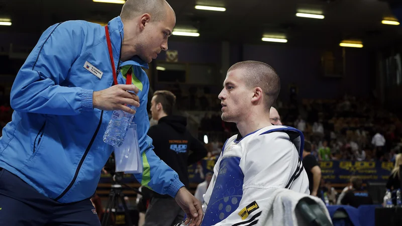 Fotografija: Ivan Trajkovič (desno) je tudi po besedah trenerja Jureta Pantarja (levo) glavni slovenski adut v Sofiji. FOTO: Blaž Samec/Delo