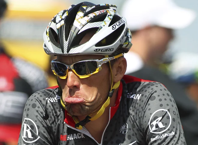 Si je Lance Armstrong pomagal tudi z motorjem? FOTO: Anthony Bolante/Reuters