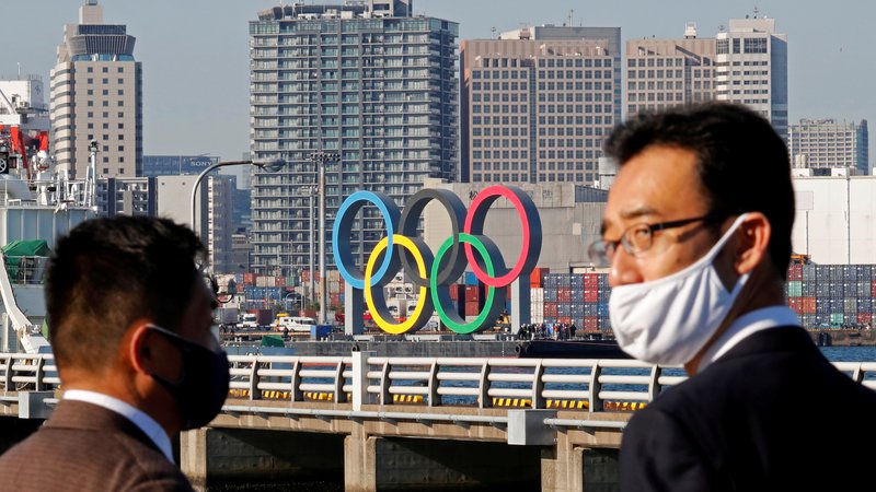 Fotografija: Japonci niso pretirano navdušeni nad tem, da bi v letošnjem poletju izpeljali olimpijske igre v Tokiu. FOTO: Kim Kyung-hoon/Reuters