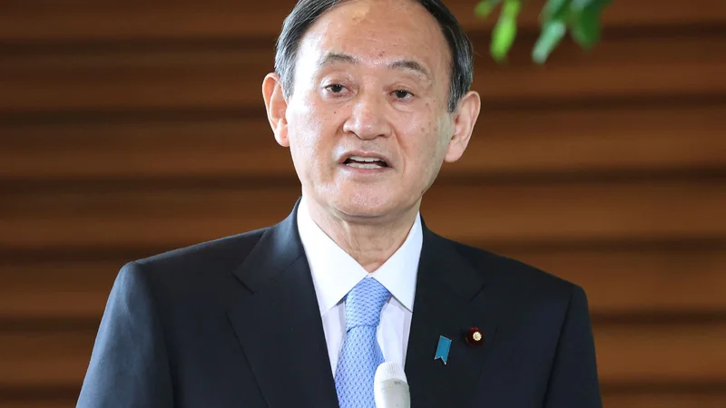 Fotografija: Japonski premier Jošihida Suga se bo jutri v Beli hiši sestal z Joejem Bidnom. FOTO: Jiji Press/AFP