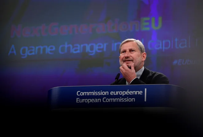Evropski komisar za proračun Johannes Hahn pričakuje, da bodo že julija izpolnjeni pogoji za zadolževanje EU.<br />
FOTO: John Thys/AFP