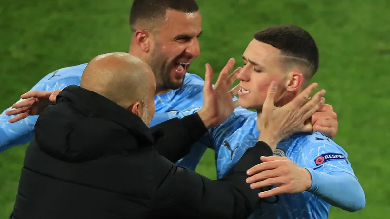 Pep Guardiola ni skrival čustev, ko je Phil Foden v Dortmundu zabil še drugi gol in potrdil napredovanje Manchester Cityja v polfinale lige prvakov. FOTO: Wolfgang Rattay/AFP