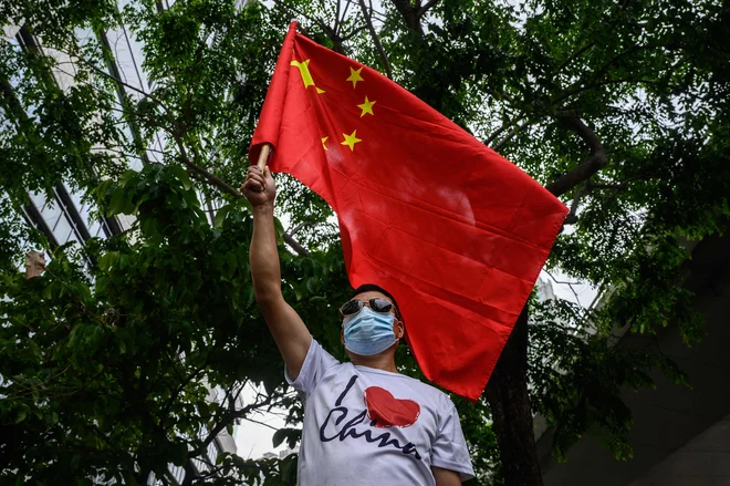 Komunistična partija Kitajske slavi 100. rojstni dan. Vodstvo v Pekingu ne bo dovolilo, da ta veliki jubilej ne bi bil okrašen z lovorikami uspeha. Foto Anthony Wallace/AFP