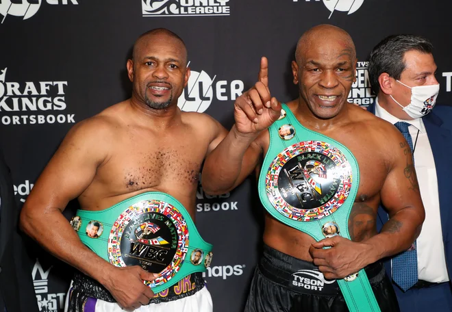 Celo Roy Jones mlajši (levo, z Mikom Tysonom) je opazil Emo Kozin. FOTO: Joe Scarnici/Usa Today Sports