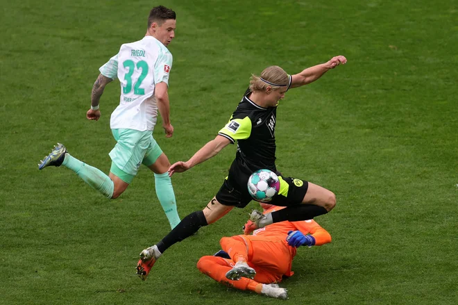 Erling Håland je z dvema goloma končal nioz sedmih tekem brez gola. FOTO:Friedemann Vogel/AFP