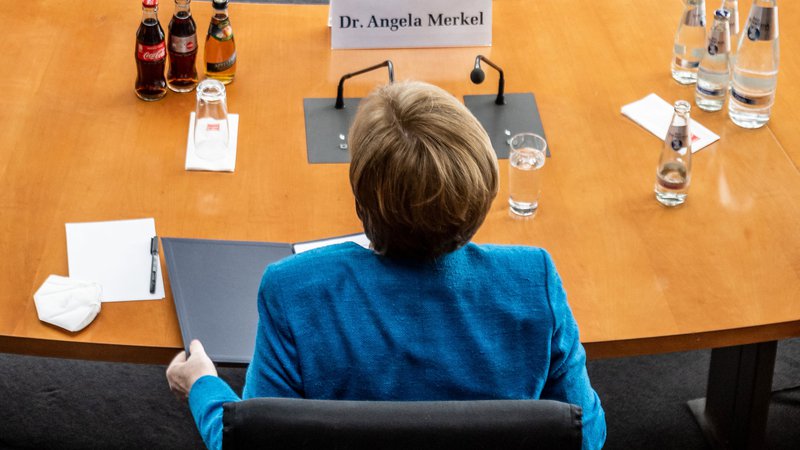 Fotografija: Kanclerka Angela Merkel je odgovarjala na vprašanja poslancev o aferi Wirecard. FOTO: Michael Kappeler/AFP