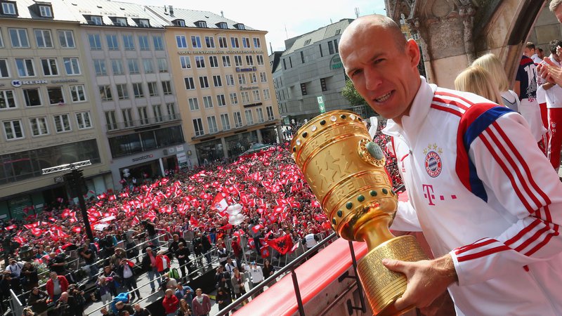 Fotografija: München je pravo nogometno mesto, kar je občutil tudi Arjen Robben, nekdanji Bayernov as iz Nizozemske. FOTO: Alexander Hassenstein/AFP