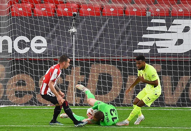 Tudi Jan Oblak ne zmore vsega, v Bilbauu je bil nemočen pri golih domačega Athletica. FOTO: Ander Gillenea/AFP