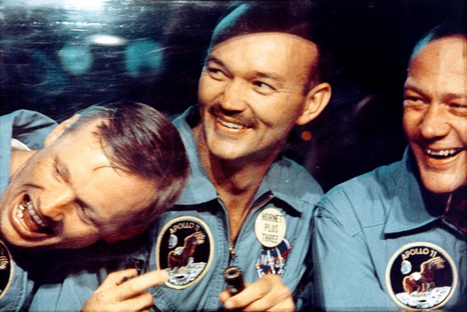 Neil Armstrong, Michael Collins in Buzz Aldrin 24. julija 1969, med karanteno po povratku Apolla 11. FOTO: Nasa/Reuters