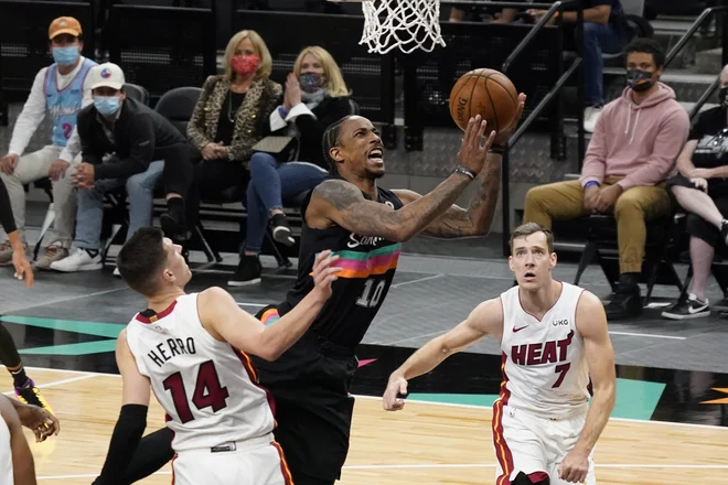 Goran Dragić (desno) je bil vnovič med najbolj aktivnimi na igrišču. FOTO: Scott Wachter/USA Today Sports