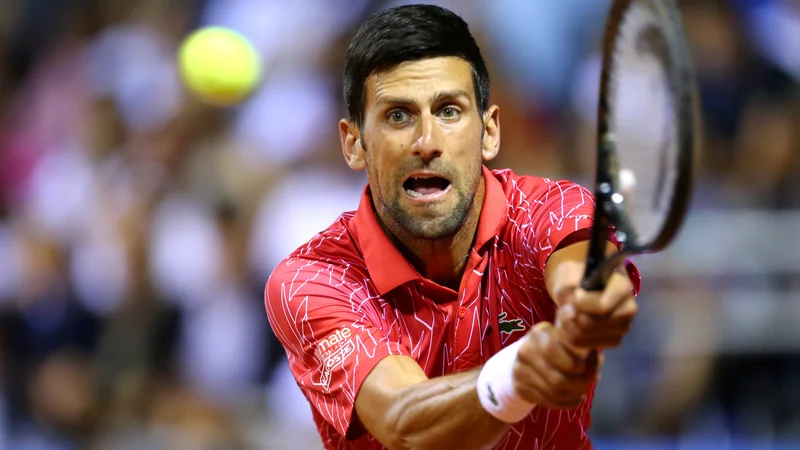 Fotografija: Novak Đokovic na večni lestvici turnirjev za grand slam lovi Rogerja Federerja in Rafaela Nadala. FOTO: Antonio Bronić/ Reuters