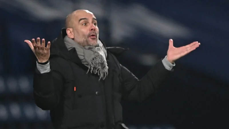 Fotografija: Pep Guardiola spoštuje svoje igralce in ne sebi ne sistemu, kot je 4-3-3 ali 3-5-2, ne daje prednosti pred njimi. On je njihov prijatelj in njihov služabnik, razmišlja v svoji kolumni direktor eura 2024 Philipp Lahm. FOTO: Laurence Griffiths/Reuters
