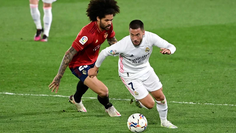 Fotografija: Eden Hazard stopnjuje formo in je veliki adut Zinedina Zidana za jutrišnji dvoboj proti Chelseaju. FOTO: Javier Soriano/AFP
