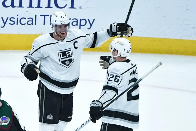Sean Walker in Anže Kopitar sta se veselila zmage. FOTO: Matt Kartozian/USA Today Sports