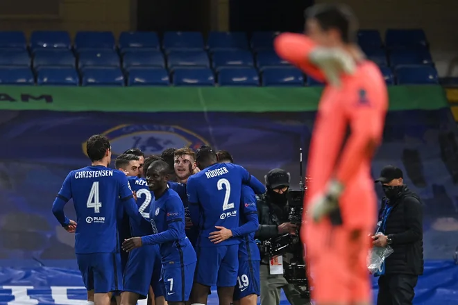 Chelsea je nadigral bledi Real pri katerem je bil še najboljši vratar Courtois. FOTO: Glyn Kirk/AFP