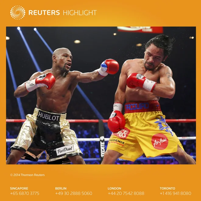 Za Floydom Mayweatherjem je imenitna športna pot, takole je leta 2015 opravil s Filipincem Mannyjem Pacquaiaom. FOTO: Steve Marcus/Reuters