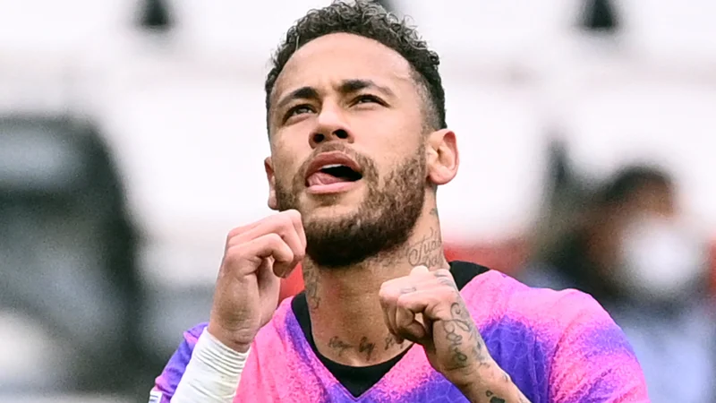 Fotografija: (FILES) In this file photo taken on May 01, 2021 Paris Saint-Germain's Brazilian forward Neymar celebrates after scoring a goal during the French L1 football match between Paris Saint-Germain and RC Lens at the Parc des Princes stadium in Paris. - Neymar has agreed a contract extension with Paris Saint-Germain until 2025, the reigning French champions announced on May 8, 2021. (Photo by Anne-Christine POUJOULAT / AFP) Foto Anne-christine Poujoulat Afp