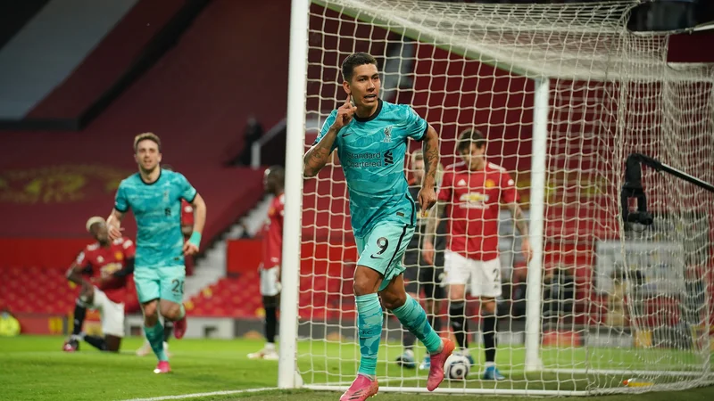 Fotografija: Roberto Firmino je z dvema goloma spravil Manchester United v velike težave v derbiju. FOTO: Dave Thompson/Reuters