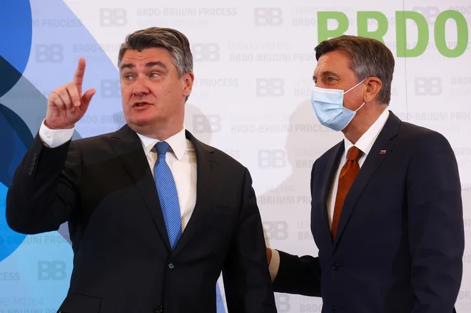 Borut Pahor z Zoranom Milanovićem. FOTO: Borut Zivulovic/Reuters