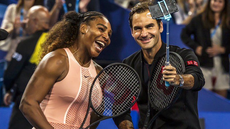 Fotografija: Serena Williams in Roger Federer sta sodelovala v dvojicah. FOTO: Tony Ashby/AFP