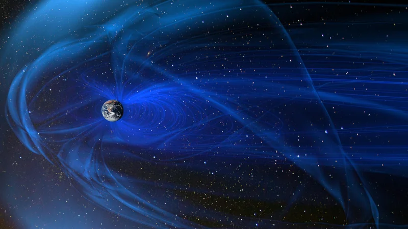 Fotografija: Sončevo magnetno polje potiska, drega in usmerja kozmične žarke pri potovanju po osončju. Po razgibani poti žarki naposled dosežejo Zemljino magnetno polje. Delci s Sonca se ujamejo v magnetne silnice in večinoma vstopijo v atmosfero v bližini severnega in južnega magnetnega pola. Shutterstock