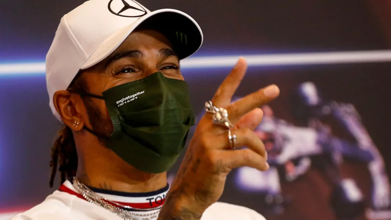 Lewis Hamilton se veseli spektakularne dirke v Monte Carlu. FOTO: Sebastien Nogier/AFP