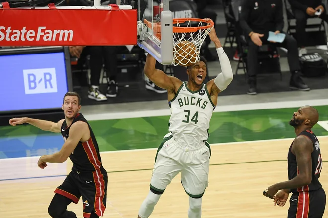 Giannis Antetokounmpo je bil premočen za Miami in Gorana Dragića. FOTO: Quinn Harris/AFP