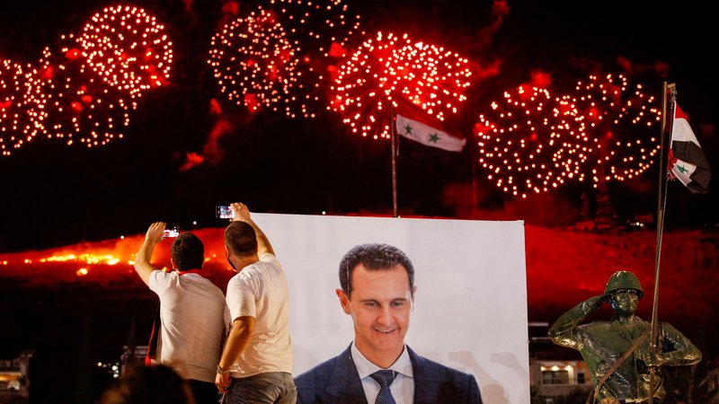 Fotografija: Asadova protikandidata sta bila dokaj neznana izzivalca. Skupaj sta osvojila 4,8 odstotka glasov. FOTO: Omar Sanadiki/Reuters