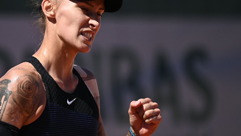 Fotografija: Polona Hercog se je takole veselila uvodne zmage v Roland Garrosu. FOTO: Anne-christine Poujoulat/AFP